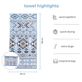 Full-size Nap and Sun Azure Tribe towel displayed with matching neoprene wetbag. Text overlay highlights features: sand repellent, quick drying, extra large, neoprene bag.