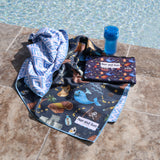 Blue, pirate, whale pattern children beach towel by the poolside with a wetbag