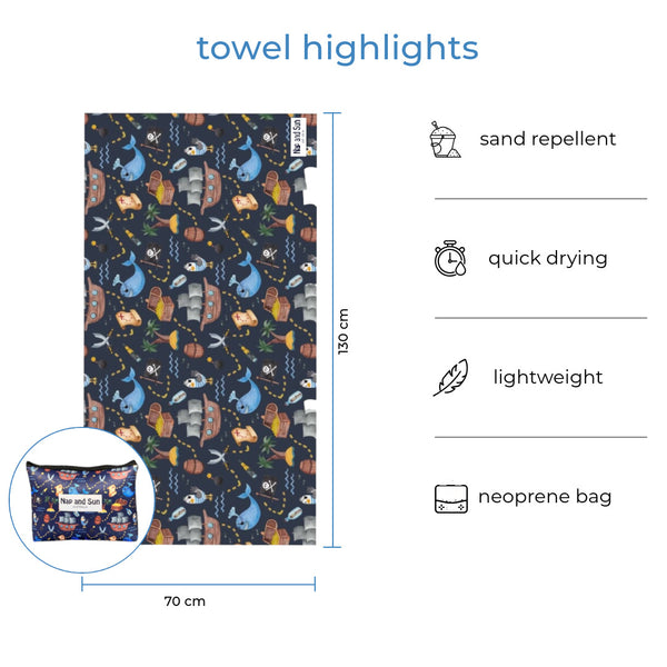 Kids-size Treasure Island, pirate theme towel displayed with matching neoprene wetbag. Text overlay highlights features: sand repellent, quick drying, lightweight, neoprene bag.