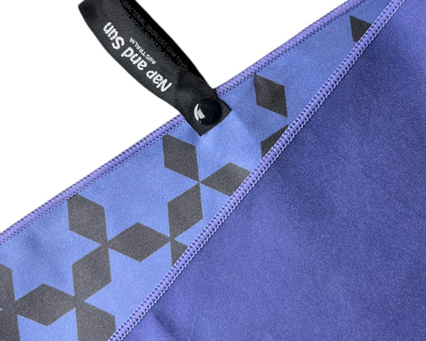 Close up of a blue towel with a haning loop