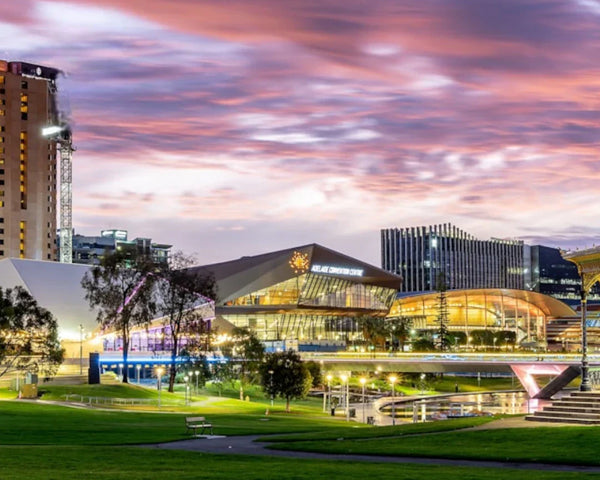 sunset image of Adeliade city garden and bulidings