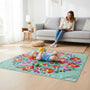 baby on a playmat in a living room with mum wathing him from the couch