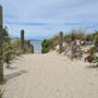 walkway to a sandy beach