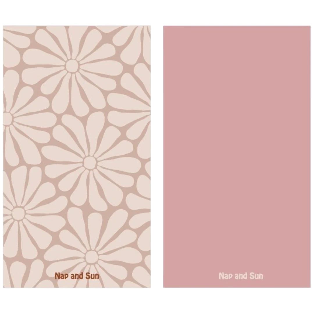 Nap and Sun Nude background towel with light nude hippy-style flower pattern, solid pink color on the back, eco-friendly, quick-dry, and compact design