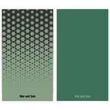 Nap and Sun Green towel featuring a black star pattern on the front, solid green color on the back, eco-friendly, quick-dry, antibacterial and compact design.