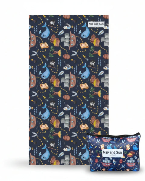 Pirate themed beach towel for kids with pouch on a white background