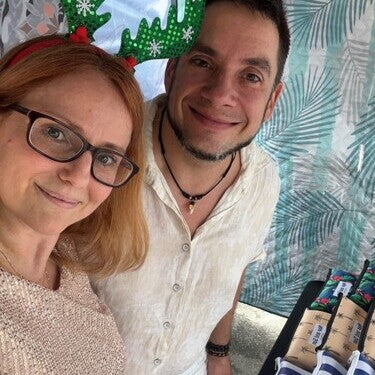 Nap and Sun team inside our market stall, showcasing our eco-friendly products