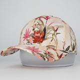 Floral-patterned cap on a gray background