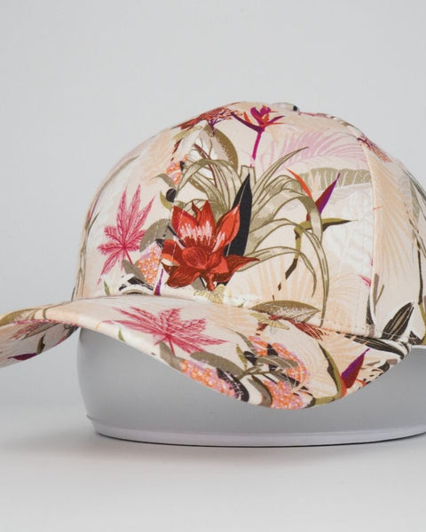 Floral-patterned cap on a gray background