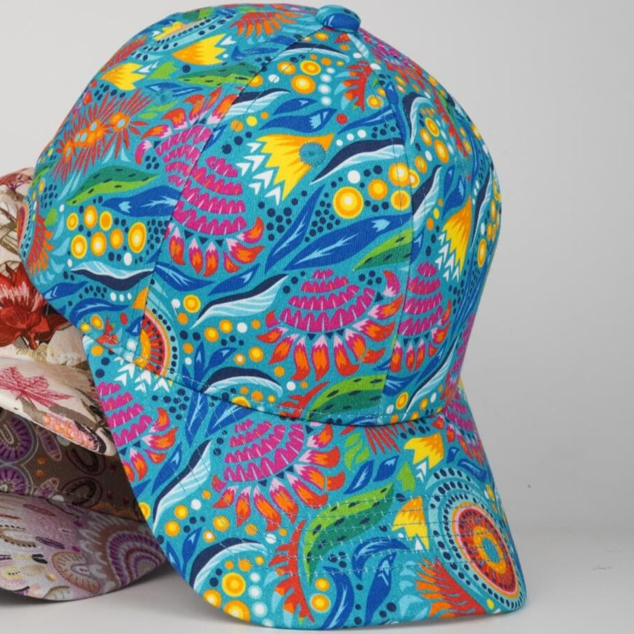 Colorful patterned fabric with fish design on a plain background