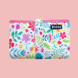 Floral-patterned pouch with pink zipper on a pink background