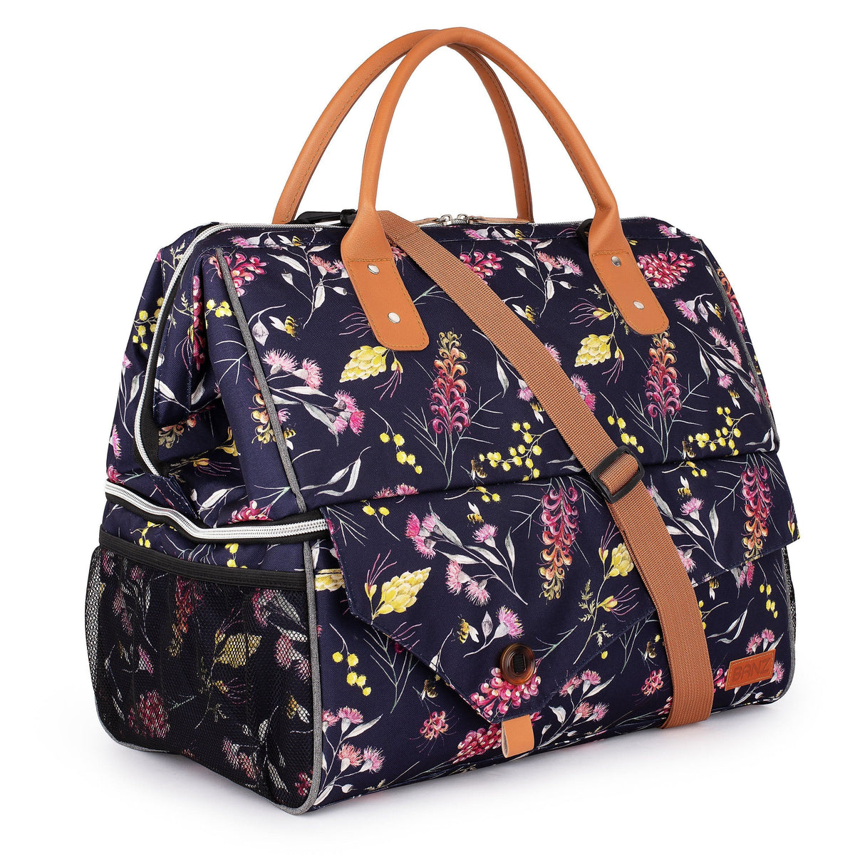 Floral-patterned bag with brown handles and strap on a white background