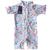 Floral-patterned baby swimsuit with a visible brand tag on a white background