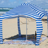 Blue mandala pattern waterproof picnic blanket with a sun cabana on the beach
