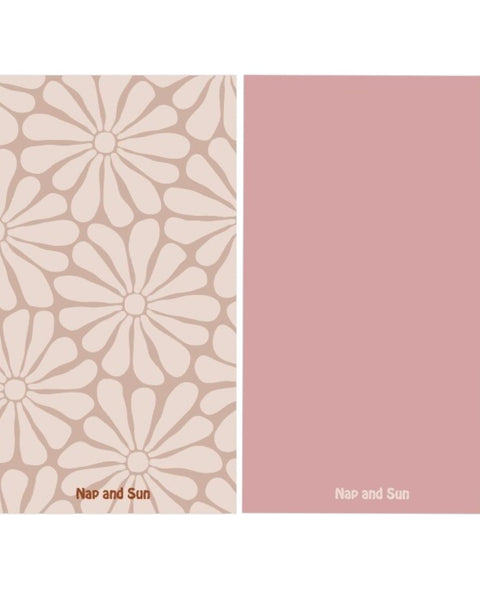 Nude colour gym towel with light nude hippy-style flower pattern, solid pink color on the back.