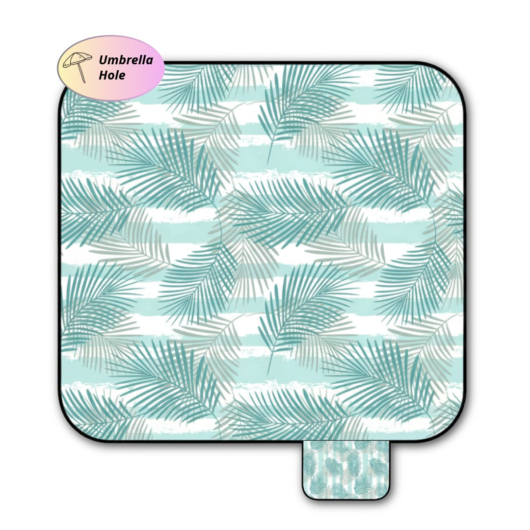 Palm leaf pattern picnic blanket with umbrella hole sing on white bagckground