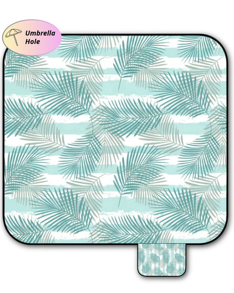 Palm leaf pattern picnic blanket with umbrella hole sing on white bagckground