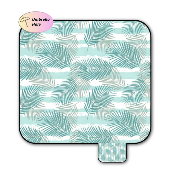 Palm leaf pattern picnic blanket with umbrella hole sing on white bagckground