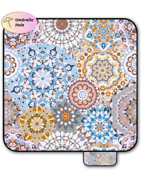 Mandala patterned picnic blanket on a white background with umbrella hole