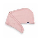 Pink textured hair wrap towel on a white background