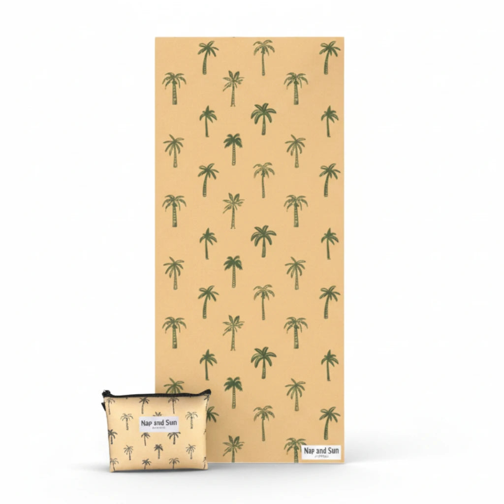 Mustard colour Beach towel with palm tree pattern and matching pouch on a white background