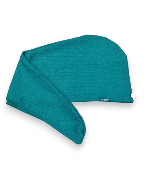 Teal hair wrap towel on a white background