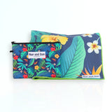 Napandsun Tropical Bliss sand-free beach towel featuring vivid green tropical leaves with yellow and red hibiscus and white frangipani flowers.  Free matching wet bag is included. 