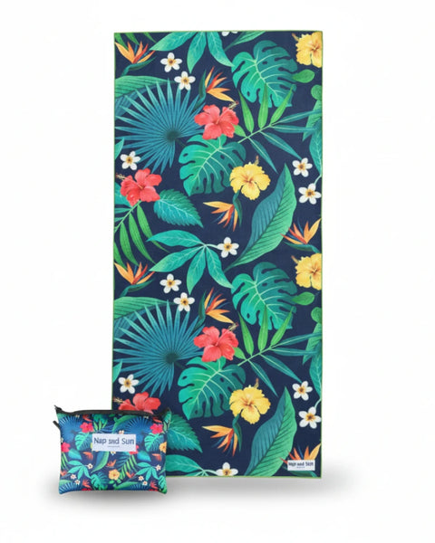 Tropical leaf patterned towel with a matching pouch on a white background