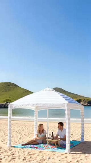 short clos up video of a cabana and picnic mat on a sandy beach